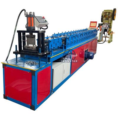 China 105mm Punching Hole Shutter Door Roll Forming Machine 8-20m/min Working speed for sale