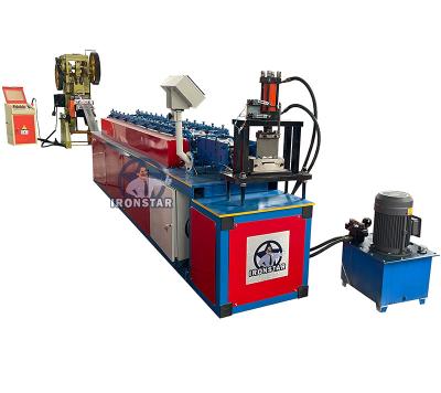 China 111mm Punching Hole Roller Shutter Door Roll Forming Machine  4KW for sale
