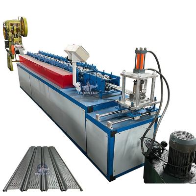 China Roller Steel Punching Hole Door Shutter Roll Forming Machine PLC control for sale