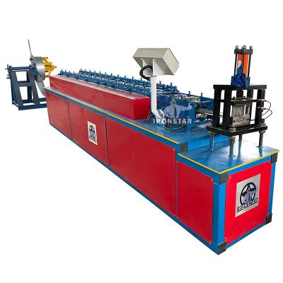 China Red 100mm Roller Shutter Roll Forming Machine With Manual Decoiler for sale