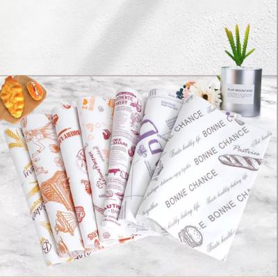 China 40gsm Greaseproof Food Wrapping Paper 10x10 Cake Packaging Jumbo Roll for sale