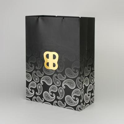 中国 Luxury Famous Brand Gift Custom Printed Shopping Paper Bag With Your Own Logo 販売のため