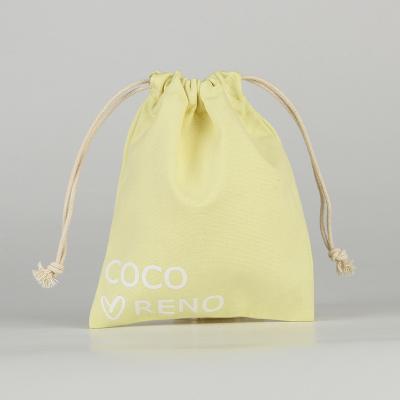 China Lemon Color Eco Friendly Organic Muslin Cotton Pouch Promotional Small Drawstring Bag for sale
