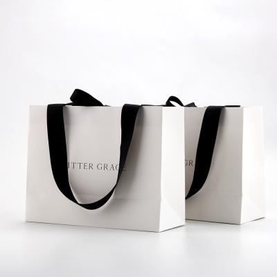 China Sustainable Eco-Friendly Fancy Custom Bamboo Paper Shopping Gift Bags for sale