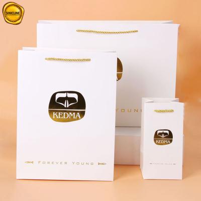 China Custom Different Sizes Custom Paper Bags For Promotion And For Cosmetics for sale