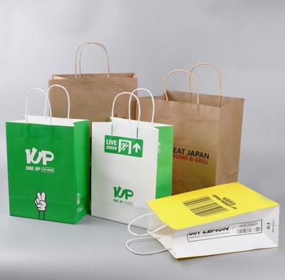 China Kundenspezifische Großhandelskraftpapier-Taschen-Handtaschen-Geschenk-Taschen-Einkaufstasche-Papierverpackentasche zu verkaufen