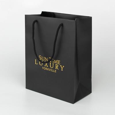 China Paperboard Black Custom Paper Shopping Bag With Soft Handle à venda