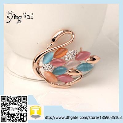 China Unique Design Wholesale Fashion Plating gold alloy with opals and rhinestone swan brooch for sale