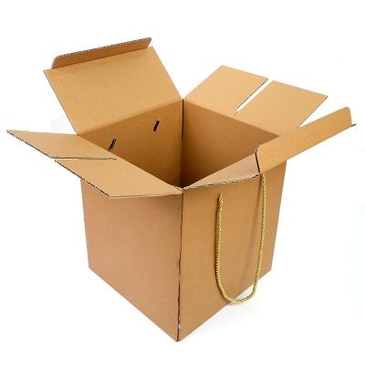 China Custom Kraft Paper Packging Material Portable Gift Box With Folding And String for sale