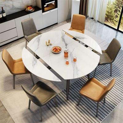 China Customized Luxury Round Extendable Dining Table With Chairs for sale