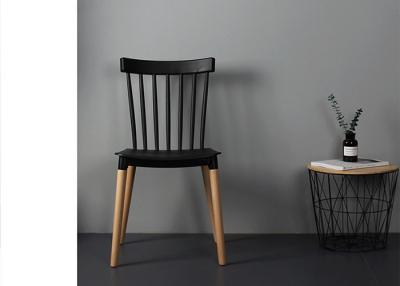 China Restaurant Wooden Leg Plastic Chair 130kg Bearing Polypropylene PP for sale