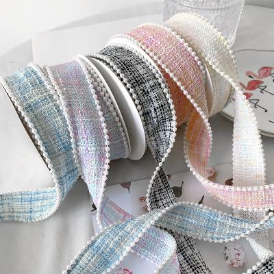 China 25 mm de poliéster cinta de rejilla de plata cinta de perla borde OEM ODM en venta