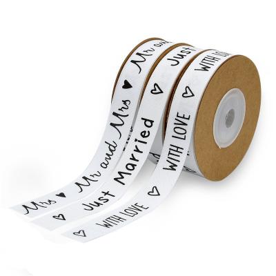 China Custom Printed Cotton Ribbon 15mm*10m White Gift Packing Ribbon for sale