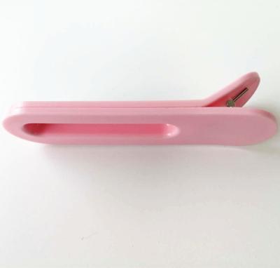 China Custom injection plastic parts Pink Clip Plastic Injection Moulding Service For Daily Necessities for sale