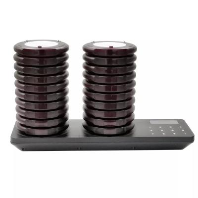 China OEM Waterproof Wireless Transmitter Pager Restaurant System Vibrators Queue System Table Coaster Pager en venta