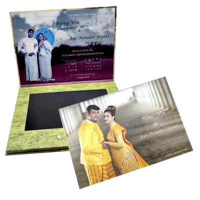 China Álbum video do cartão video feito sob encomenda do encarregado do envio da correspondência da brochura do dobrador do casamento do livro à venda