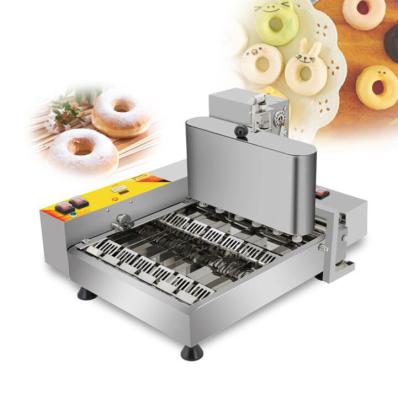 China Sweet Shop 4 Rows 1080pcs/H Automatic Donut Making Machine for sale