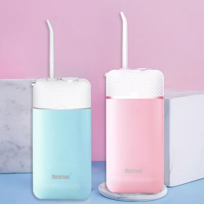 China Mini Design Collapsible Water Flosser Electric Water Flosser Oral Irrigator With Storagable Nozzle for sale
