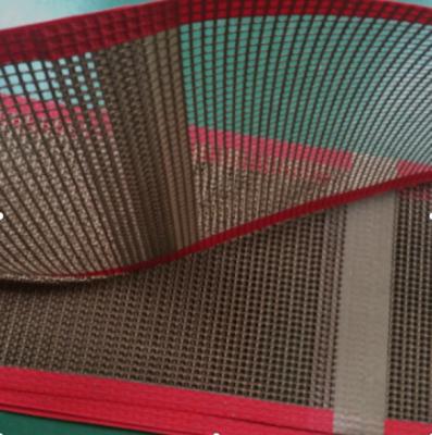 China Bullnose Gezamenlijke PTFE Mesh Conveyor Belt Heat Resistant Te koop