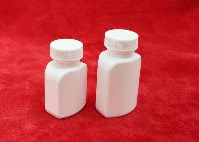China botella blanca del suplemento de la altura de 61m m, contenedores de almacenamiento de la botella de píldora del tapón de tuerca  en venta