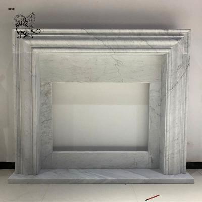 China White Marble Fireplace Mantel Freestanding Natural Stone Fire Place Handcarved European Style Home Decor en venta