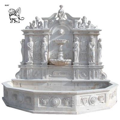 China Marble Wall Fountains Italian Glorious Lion Head And Figure Relief  Stone Garden Decor for sale