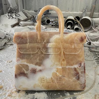 China Famous Brand Bag Marble Sculpture Home Decor Sunset Red Natural Stone Hand Carved for sale