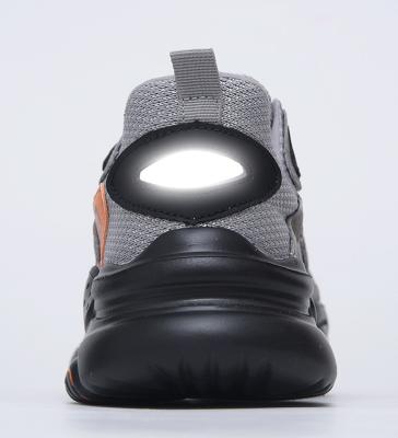 China Breathable And Wear-Resistant Flying Woven Surface Safety Protection Anti-Smashing And Anti-Piercing Work Shoes for sale