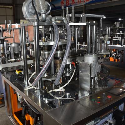 China Tapa del papel de taza de café que hace máquina DJP-100 de proceso automático en venta