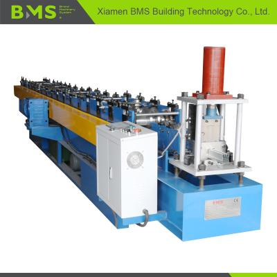 China Shutter Door Guide Roll Forming Machine With Mold Steel Cr12 Cutter Heat Treatment for sale