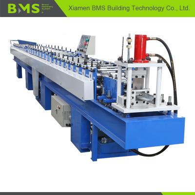 China Metal T Profile Roller Shutter Door Roll Forming Machine Full Automatic 12-15m/min for sale