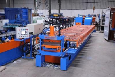 China 0.4-0.7mm Standing Seaming Roof Panel Roll Forming Machine With Cr12 Steel Cutter for sale