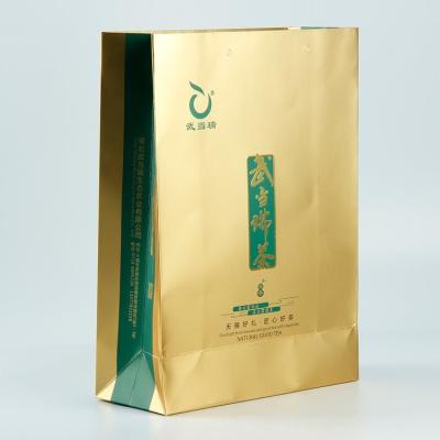 Chine La coutume de CMYK Pantone a imprimé des sacs en papier avec les poignées 300gsm à vendre