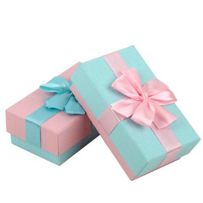 China Recycled Gray Cardboard Art Paper Gift Packing Box With Ribbon Hot Stamping for sale