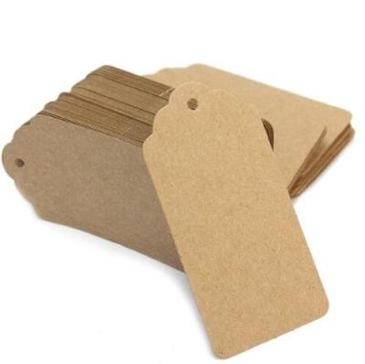 China Professional Custom Clothing Labels Brown Kraft Paper Clothing Hang Tags for sale