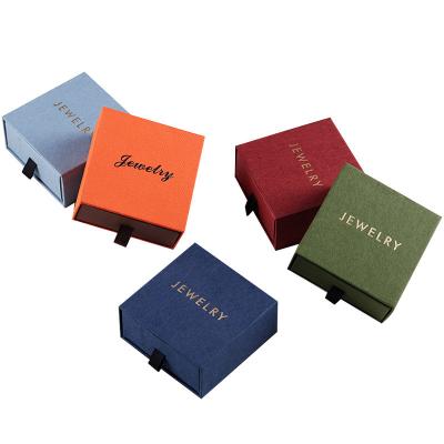 Cina Scatola d'imballaggio di carta su ordinazione della stagnola di oro di Ring Grey Cardboard Drawer Box Hot per gioielli in vendita