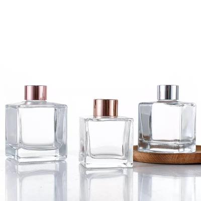 China Different Sizes 50ml 100ml 200ml Empty Square Reed Diffuser Glass Bottles With Cork for sale