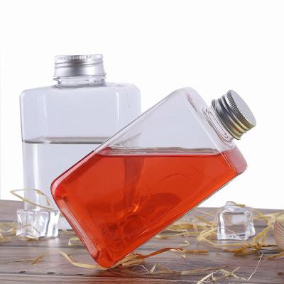 China Plastic 16 Oz Natural Beveled Square HDPE Juice Bottle UV Plating for sale