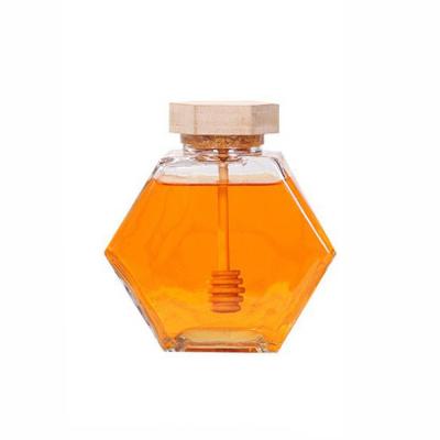 China Wooden Lid 12 Oz 13.4oz Hexagon Glass Honey Jar Transparent for sale