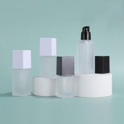 China Empty Square Frosted Glass Cosmetic Containers 1.4oz Pump Bottle Personal Care for sale