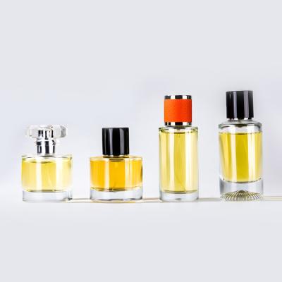 China Magnet Cap Scent Glass Cosmetic Containers Perfume Glass Bottle 50ml Crimp Seal for sale