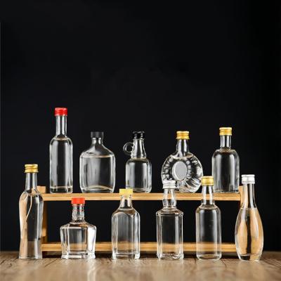 China Leak Resistant Crystal Glass Bottles 40ml 50ml Vodka Wine With Aluminium Cap for sale