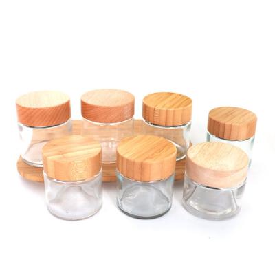China Oil Concentrate Bamboo Transparent Glass Jars Childproof Lid Dia 64mm 120ml for sale