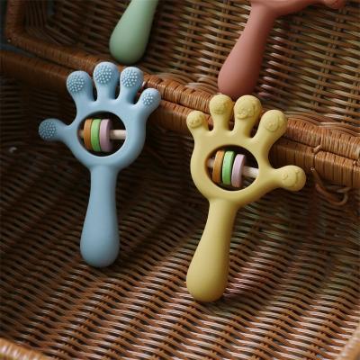 China ODM Baby Silicone Toys Age Group Babies Kids Children Rattle Palm Hand Shape for sale