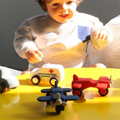 China custom and wholesale  Safe Silicone Vehicle Toys set for Babies ambulance truck motorcycles runny car toys for sale