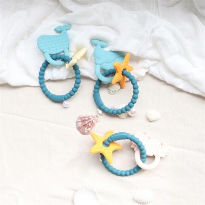 China Food Grade Silicone Baby Teether With Non - Toxic Design And Easy Grip Handle BPA Free Silicone Teething Rings Te koop