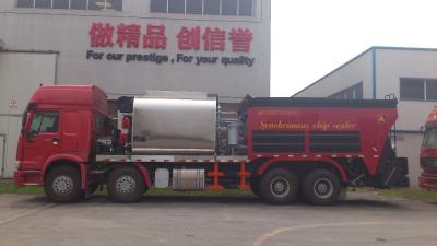 China Camión del mantenimiento de carreteras de la capacidad de la tolva de Sinotruk 14m3/equipo del revestimiento de carreteras en venta