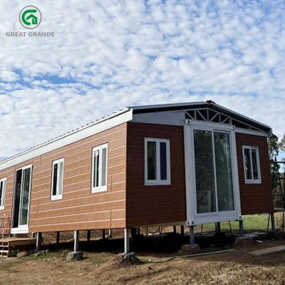 China Extended Bifold Folding Expandable Prefab House Flat Pack Container for sale