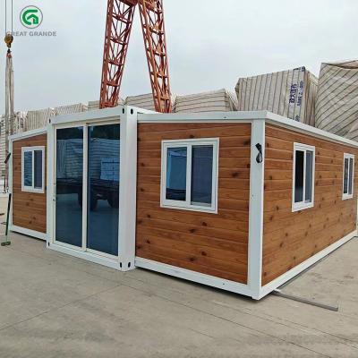 中国 広々としたデザインの鉄骨フレーム拡張可能なプレハブ住宅天然木仕上げ 販売のため
