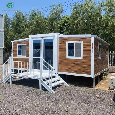 China Expandable Layout Prefab Container House Fiberglass Panels Sleek Yellow Exterior for sale